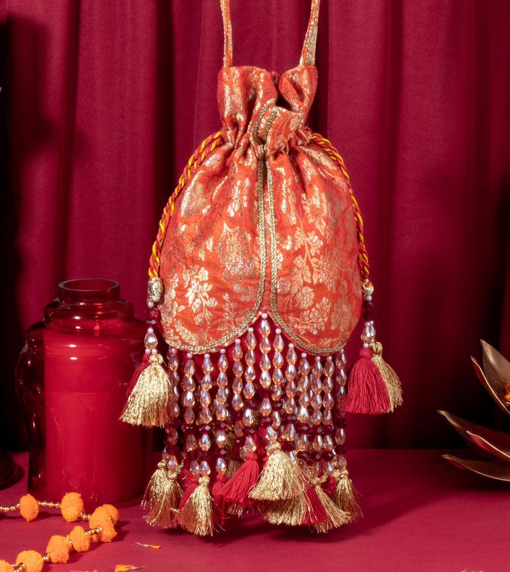 Orange Meera Tasseled Potli - Suave Bags  #